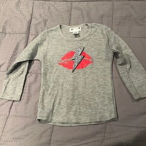 BEBE-a-go-go lightning bolt lip shirt